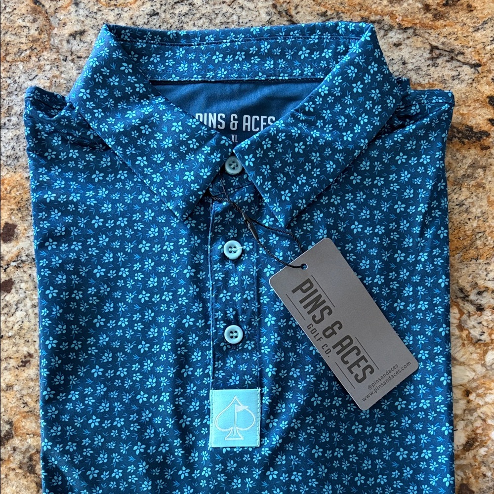 Pins & Aces Blue Patterned Polo Shirt “Micro Floral Blue”